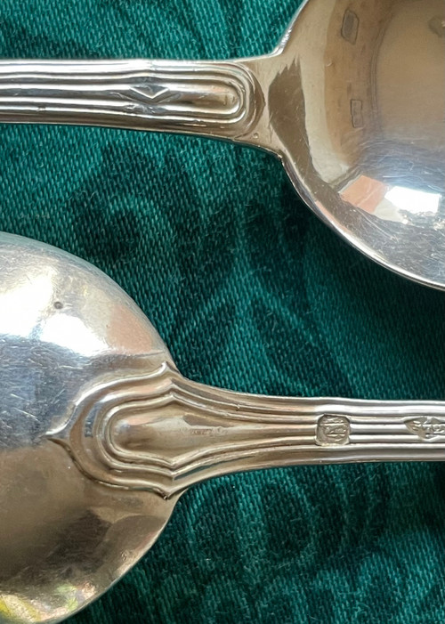 12 dessert spoons.