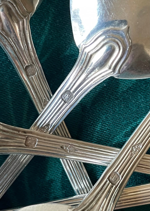 12 dessert spoons.