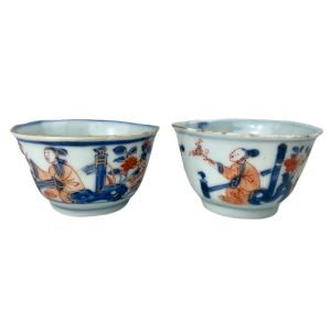 Pair Of Imari Bowls Decorated With Flowers And Characters Enhanced With Gold