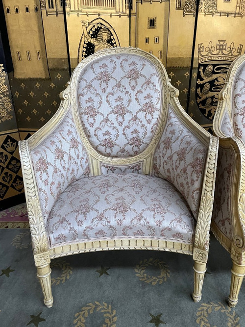 Paire de fauteuils bergères de style Louis XVI