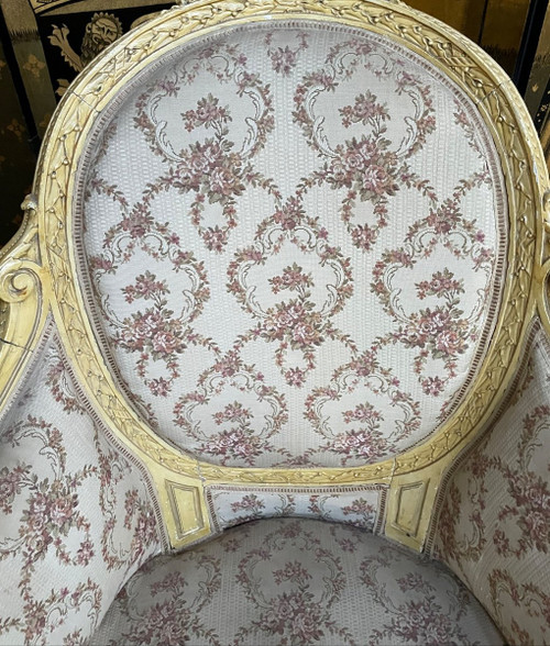 Paire de fauteuils bergères de style Louis XVI