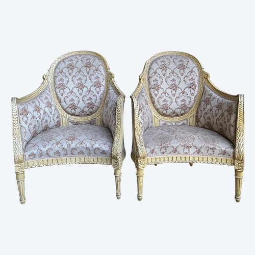 Paire de fauteuils bergères de style Louis XVI