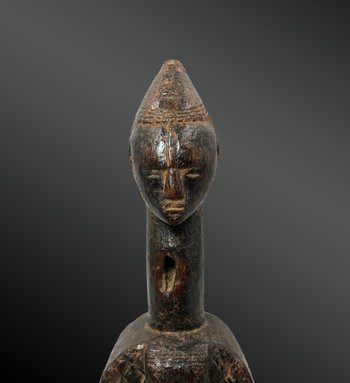 ÉTRIER de POULIE à VISAGE ANTHROPOMORPHE Culture Gouro, Côte d’Ivoire Première moitié du XXème siècle 