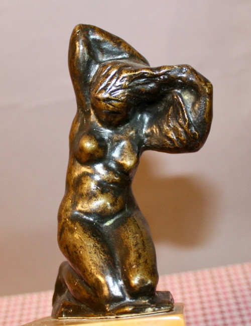 Bronzo di Léon Ernest Drivier "Bagnante che si lega i capelli"
