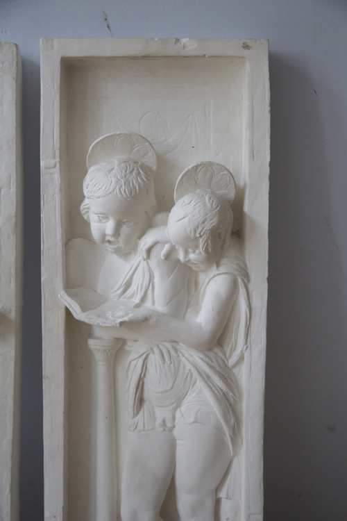 FRANZÖSISCHE Schule des 20. Jahrhunderts nach DONATELLO (1386-1466), Suite aus zwei Gipsreliefs.