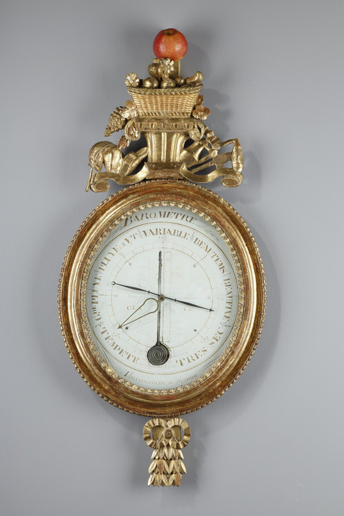 Barometer-thermometer in gilt wood, Louis XVI period