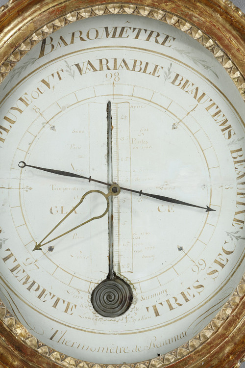 Barometer-thermometer in gilt wood, Louis XVI period