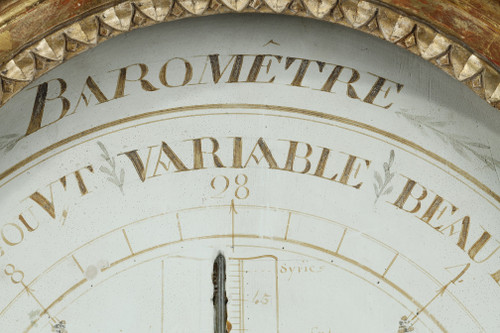 Barometer-thermometer in gilt wood, Louis XVI period