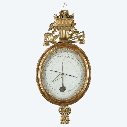 Barometer-thermometer in gilt wood, Louis XVI period