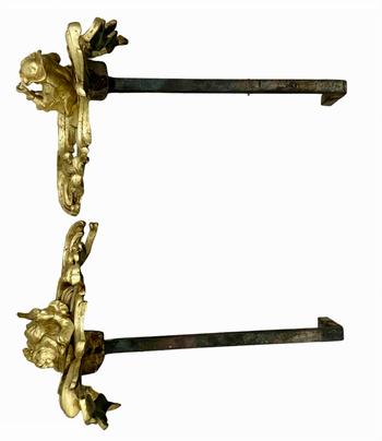 Pair of Louis XV style gilt bronze andirons representing a couple seated on rockery