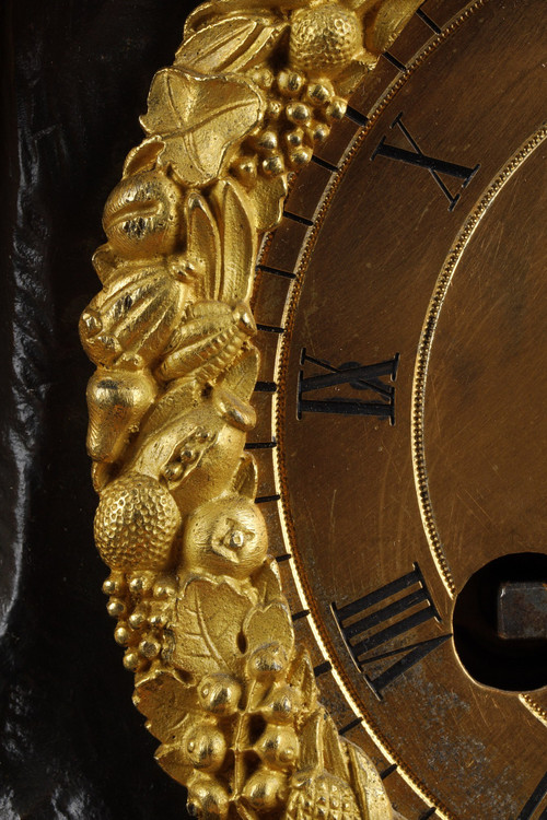 Restoration period Clock in gilt bronze with a young woman