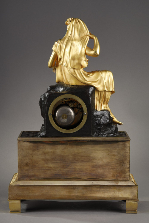 Restoration period Clock in gilt bronze with a young woman