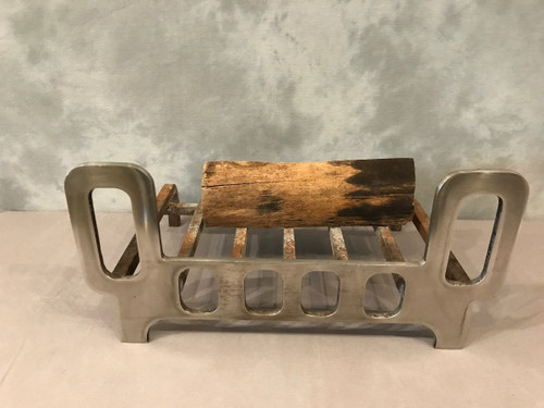 Beautiful chrome interior fireplace grill circa 1970