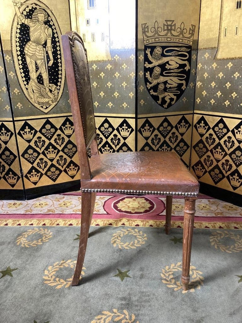 Suite di 10 sedie in pelle in stile Luigi XVI