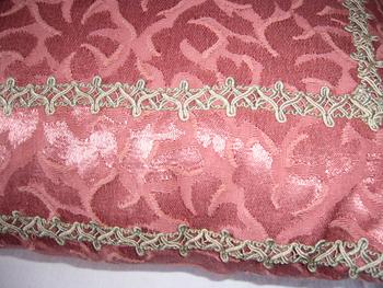 Damask and braid cushion