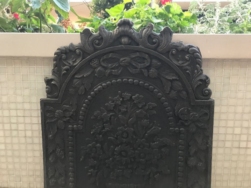 Beautiful old cast iron fireback from the 18th century