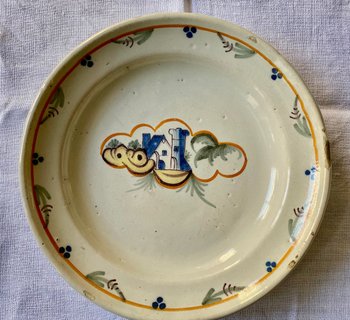 Lot of three 18th century earthenware plates