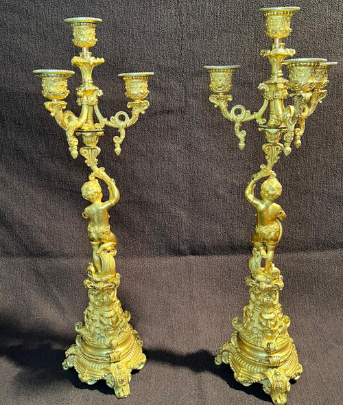 Coppia di candelabri Putti in bronzo dorato, XIX secolo