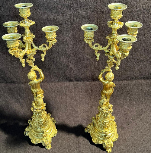 Coppia di candelabri Putti in bronzo dorato, XIX secolo