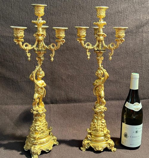 Coppia di candelabri Putti in bronzo dorato, XIX secolo