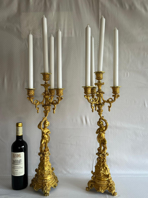 Coppia di candelabri Putti in bronzo dorato, XIX secolo