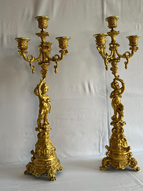 Coppia di candelabri Putti in bronzo dorato, XIX secolo