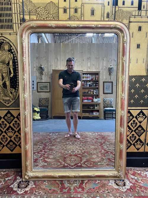 Louis Philippe period mirror in gold leaf