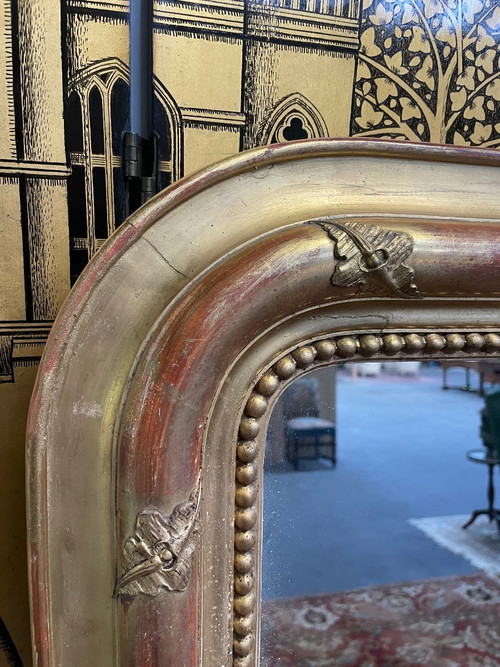 Louis Philippe period mirror in gold leaf