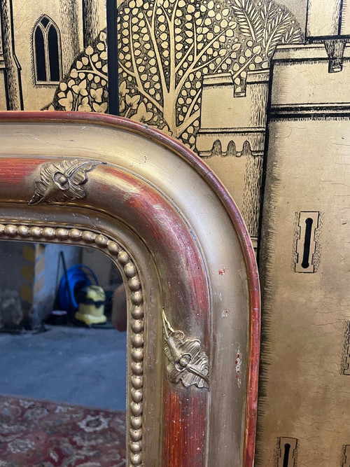 Louis Philippe period mirror in gold leaf