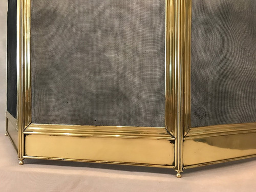 small old fireplace fire screen in polished brass from the 19th century