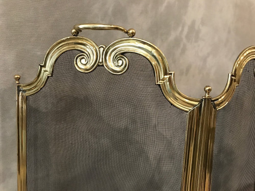 small old fireplace fire screen in polished brass from the 19th century