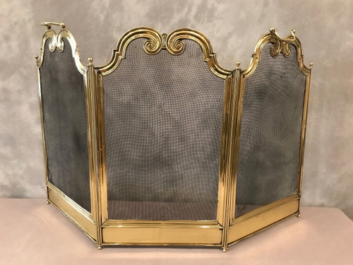 small old fireplace fire screen in polished brass from the 19th century