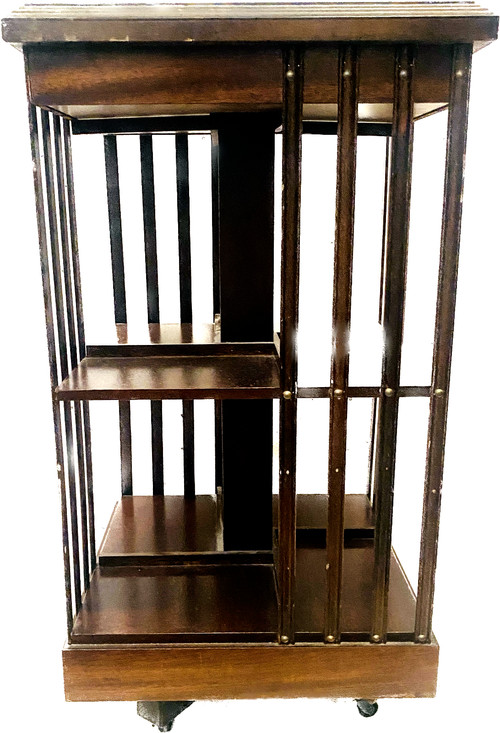 Mahogany revolving bookcase with inlaid top 20th century