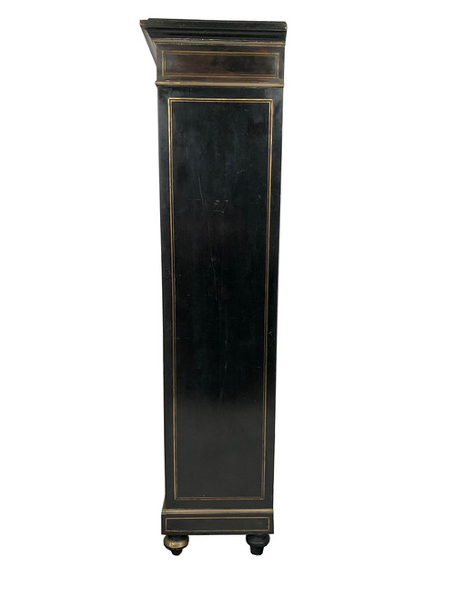 Libreria Napoleone III, legno annerito con intarsi in ottone, avorio e madreperla