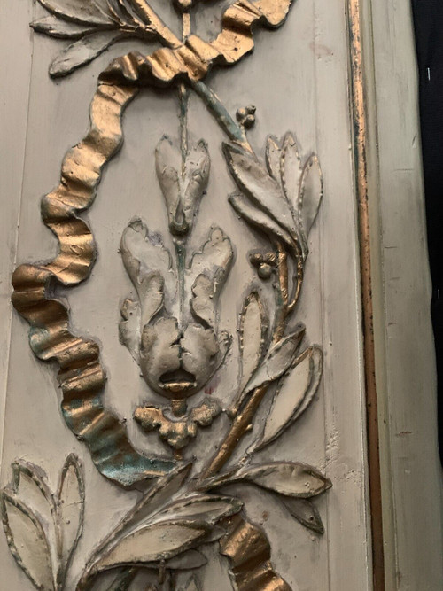 19th century patinated and gilded wood and stucco fireplace mirror