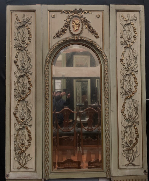 19th century patinated and gilded wood and stucco fireplace mirror