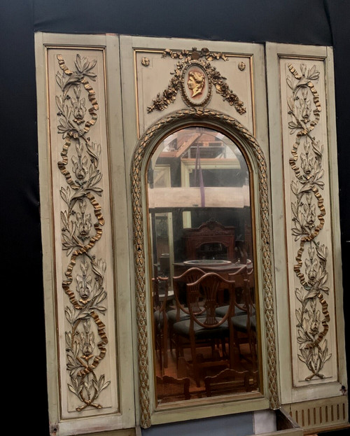 19th century patinated and gilded wood and stucco fireplace mirror
