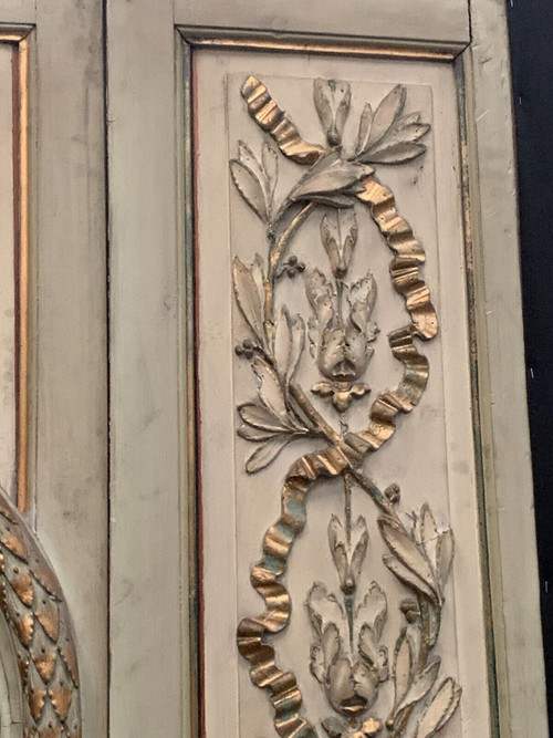 19th century patinated and gilded wood and stucco fireplace mirror