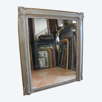 Old fireplace mirror with patina restoration