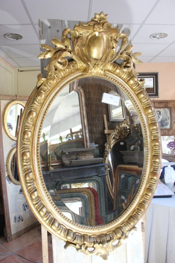 Miroir ancien ovale Napoléon III se style Louis XV doré