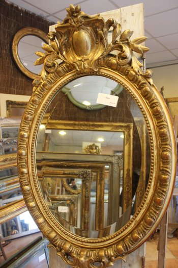 Miroir ancien ovale Napoléon III se style Louis XV doré