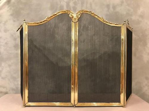 Beau pare feu de cheminée ancien en laiton d'époque 19 ème de style Louis XV 