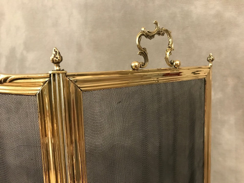 Beau pare feu de cheminée ancien en laiton d'époque 19 ème de style Louis XV 
