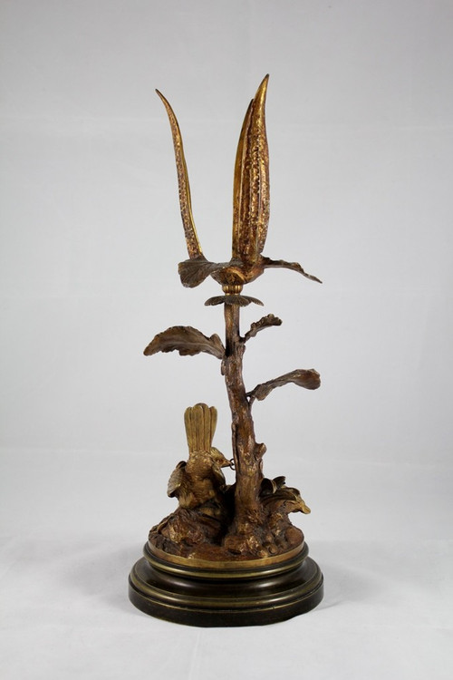 Scultura portacandele in bronzo 'Perdice che dà da mangiare alle sue pernici' fine XIX secolo