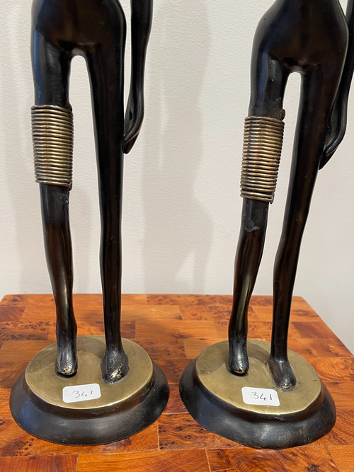 Coppia di statuette di portatori d'acqua, secondo Karl HAGENAUER, circa 1970