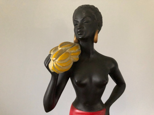 Orientalist polychrome plaster statue by Salvatore Melani (1902-1934) The Banana Carrier