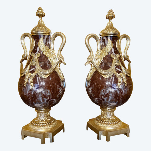 Pair of Red Marble Vases with gilded bronzes and swans in the Louis XVI style, late 19th century.