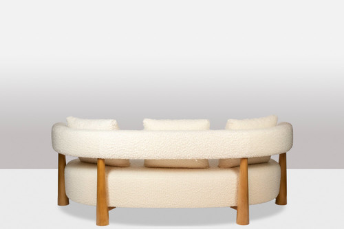 Bean-shaped 3-seater sofa in blond beech. Contemporary work.