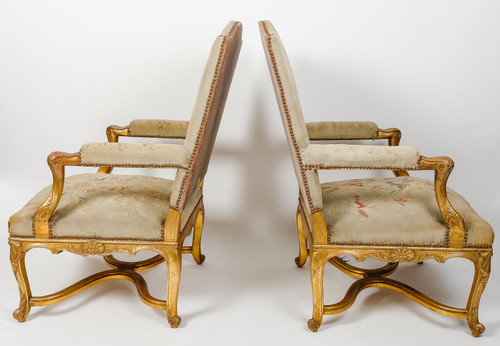 Pair of Regency-style armchairs in gilded wood, late 19th century