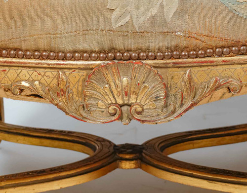 Pair of Regency-style armchairs in gilded wood, late 19th century